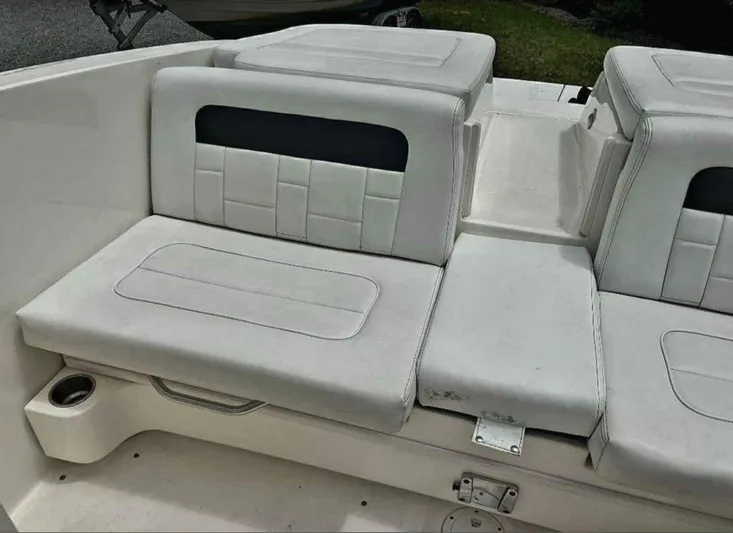  Yacht Photos Pics 2015 Sea Ray 300 SLX boat interior with white cushioned seating.