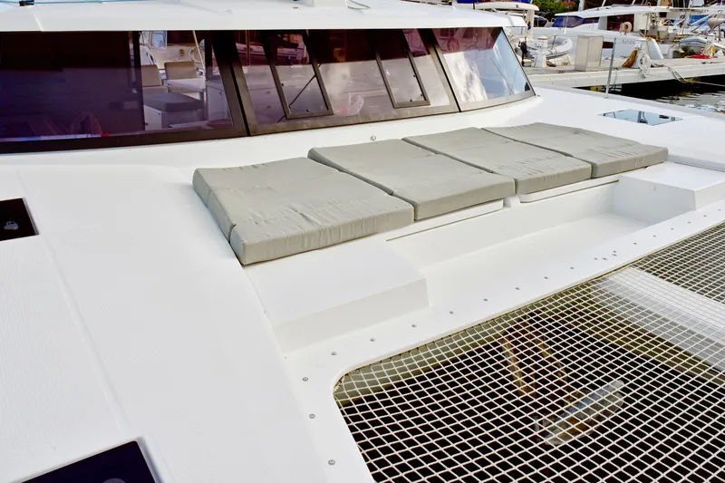 Boomerang Yacht Photos Pics Fountaine Pajot Astrea 42 catamaran deck with cushioned seating, 2022 model.
