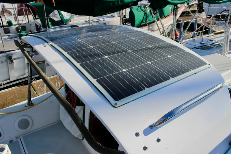 Mangata Yacht Photos Pics Solar panel on 1997 Valiant 39 yacht, docked with other boats.