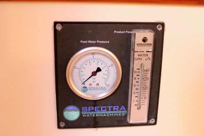 Mangata Yacht Photos Pics Spectra water machine gauge on 1997 Valiant 39, displaying feed water pressure and flow rate.