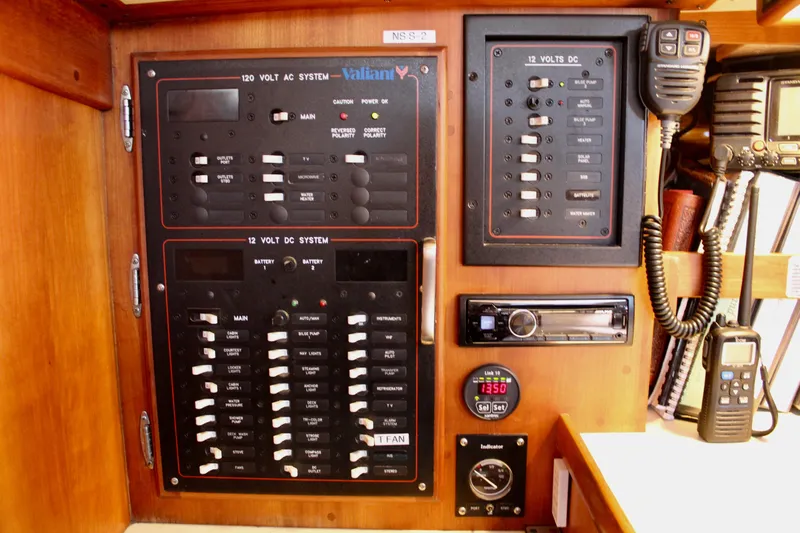 Mangata Yacht Photos Pics Electrical control panel on a 1997 Valiant 39 yacht, featuring AC and DC systems.