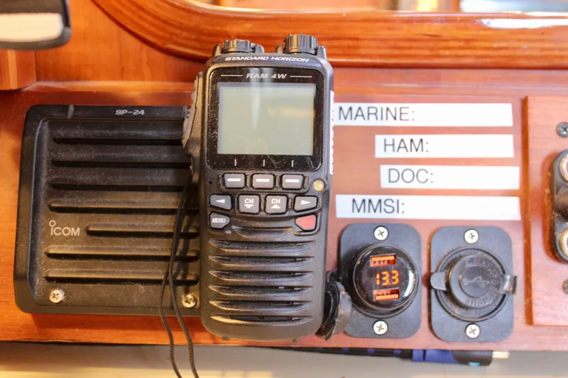 Mangata Yacht Photos Pics Radio equipment on a 1997 Valiant 39 sailboat dashboard with communication labels.