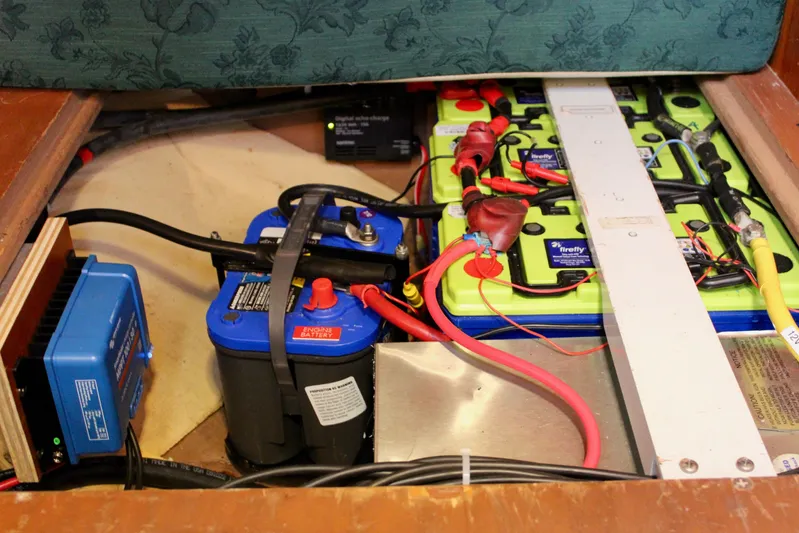 Mangata Yacht Photos Pics Battery compartment of a 1997 Valiant 39 yacht, featuring engine and auxiliary batteries.