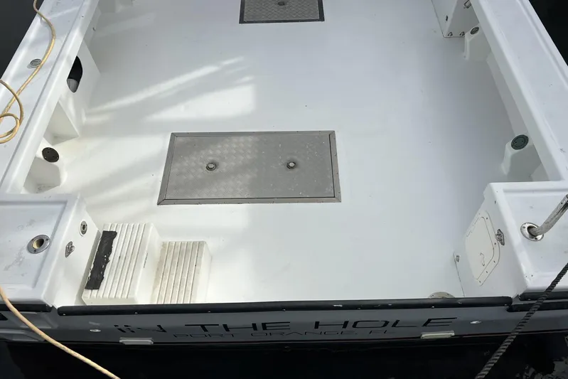  Yacht Photos Pics 2006 Provincial 42 Lobster Boat deck, featuring clean white surface and storage hatches.