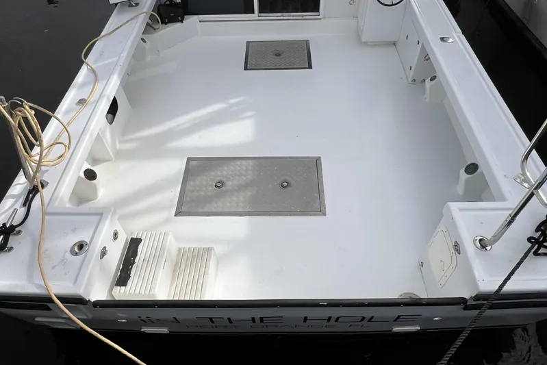  Yacht Photos Pics 2006 Provincial 42 Lobster Boat deck, featuring spacious layout and storage compartments.