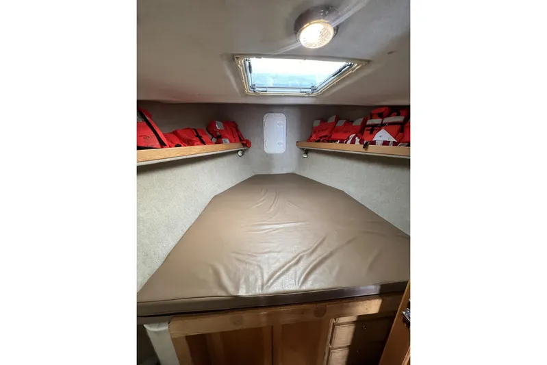  Yacht Photos Pics Interior cabin of 2006 Provincial 42 Lobster Boat with life jackets and skylight.