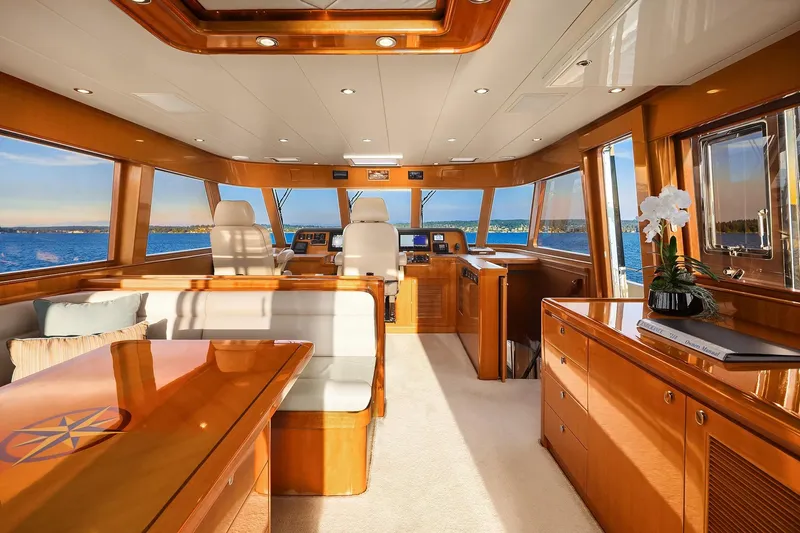 La Bella Vita II Yacht Photos Pics Luxurious interior of 2014 Hampton 720 Skylounge LRC yacht with panoramic ocean views.