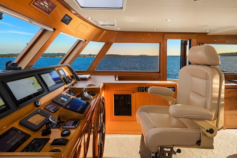 La Bella Vita II Yacht Photos Pics Luxurious helm of 2014 Hampton 720 Skylounge LRC yacht with panoramic ocean view.