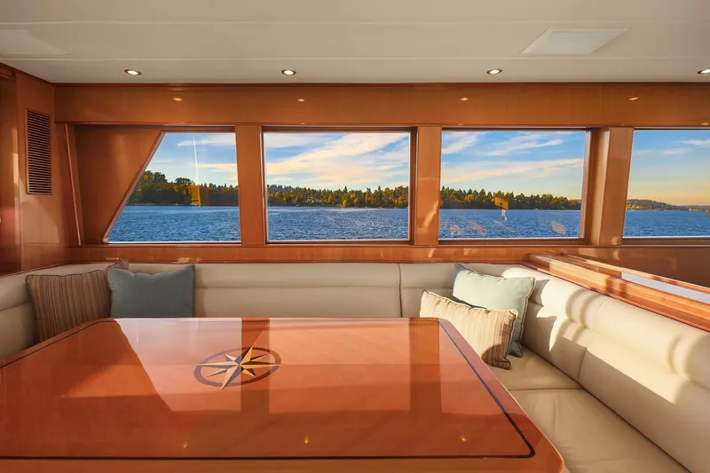 La Bella Vita II Yacht Photos Pics Luxurious interior of 2014 Hampton 720 Skylounge LRC yacht with scenic water views.