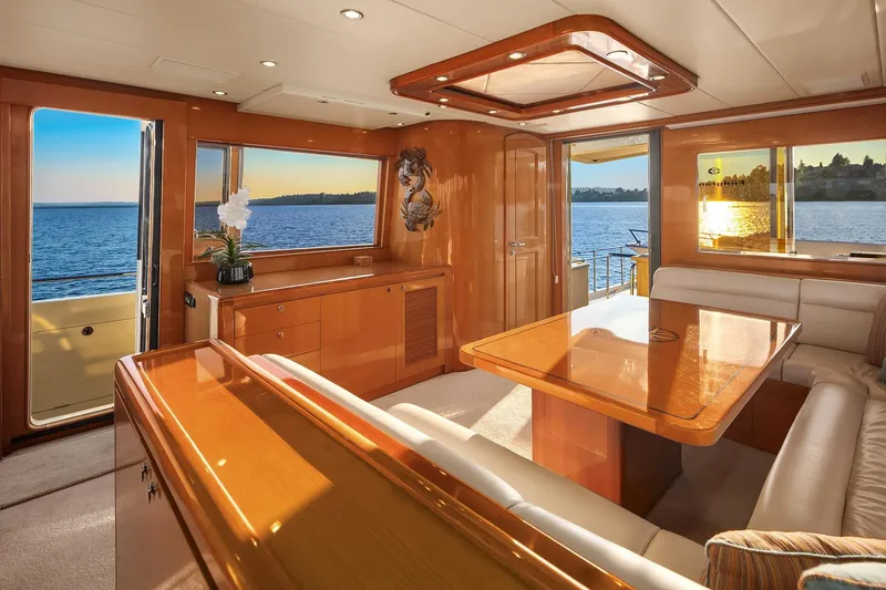 La Bella Vita II Yacht Photos Pics Luxurious interior of 2014 Hampton 720 Skylounge LRC yacht with ocean view.