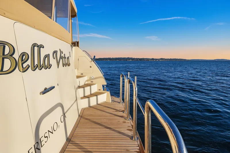 La Bella Vita II Yacht Photos Pics Luxury yacht "Bella Vita" on serene ocean, Hampton 720 Skylounge LRC, 2014 model.