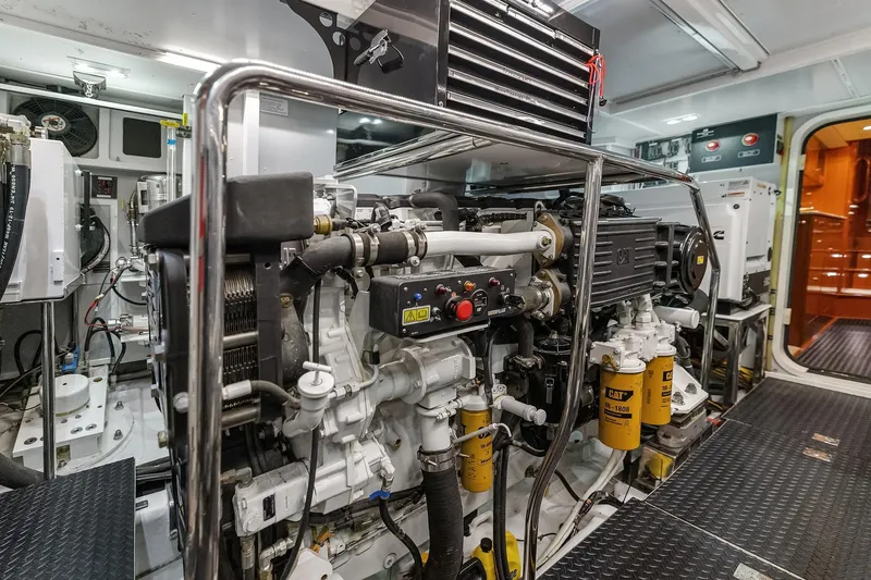 La Bella Vita II Yacht Photos Pics Engine room of 2014 Hampton 720 Skylounge LRC yacht, featuring advanced machinery and equipment.