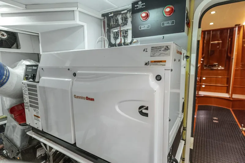 La Bella Vita II Yacht Photos Pics Cummins Onan generator in 2014 Hampton 720 Skylounge LRC yacht engine room.