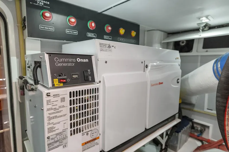 La Bella Vita II Yacht Photos Pics Cummins Onan generator in 2014 Hampton 720 Skylounge LRC yacht engine room.