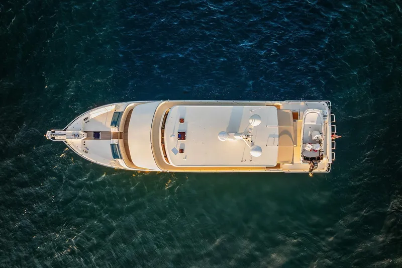 La Bella Vita II Yacht Photos Pics Aerial view of 2014 Hampton 720 Skylounge LRC yacht on deep blue water.