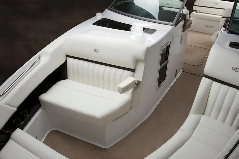  Yacht Photos Pics Manufacturer Provided Image: 2013 Cobalt 336 boat interior with white leather seating and beige carpet.