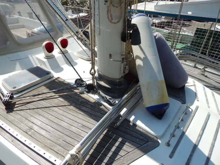  Yacht Photos Pics Deck of 1992 Tayana 55 sailboat with mast and fenders.