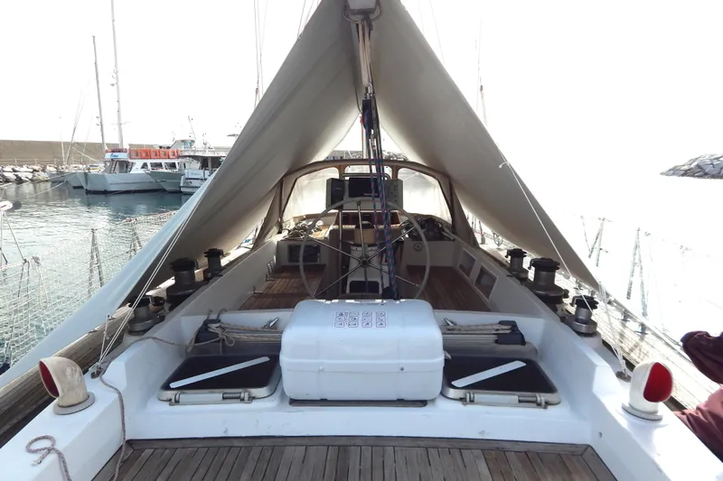  Yacht Photos Pics Sailing yacht Tayana 55, 1992 model, docked at marina with covered deck.