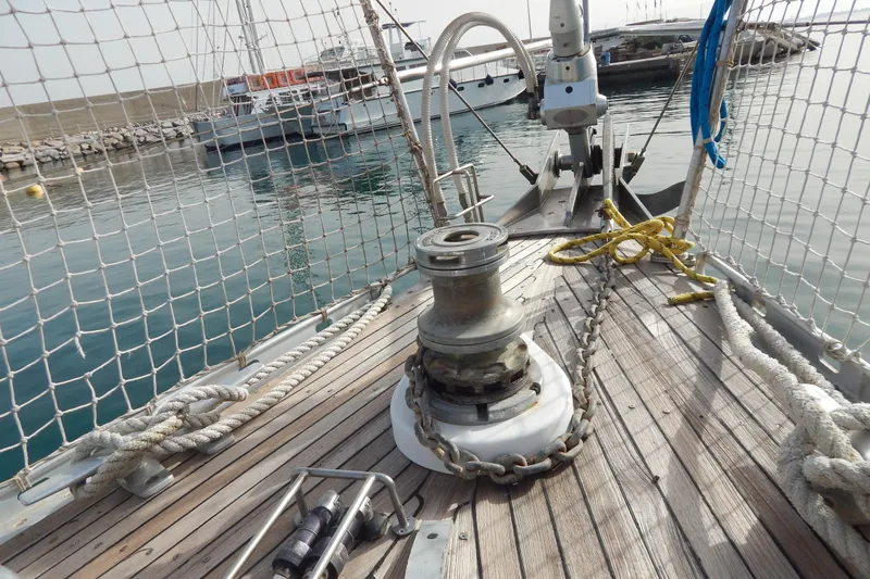  Yacht Photos Pics Deck of 1992 Tayana 55 sailboat with ropes and winch in a marina setting.