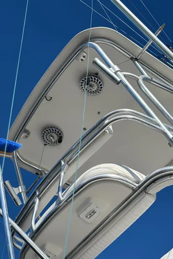 Reel Deal Yacht Photos Pics Close-up of 2001 Carolina Classic 35 boat tower against clear blue sky.