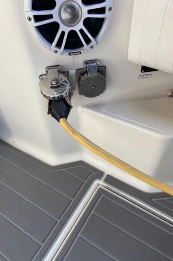 Reel Deal Yacht Photos Pics 2001 Carolina Classic 35 boat deck with speaker and power connection.