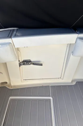 Reel Deal Yacht Photos Pics 2001 Carolina Classic 35 boat deck with storage compartment.