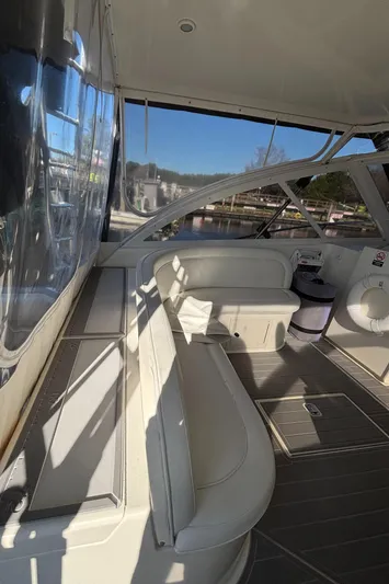 Reel Deal Yacht Photos Pics 2001 Carolina Classic 35 boat interior with white seating and spacious deck.