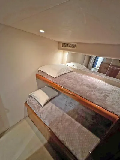  Yacht Photos Pics Interior of 2008 Viking 68 Convertible yacht with cozy bunk beds.