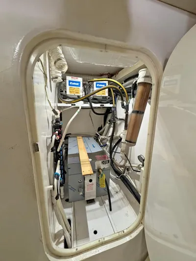  Yacht Photos Pics Engine room of 2008 Viking 68 Convertible yacht, showcasing electrical components and wiring.