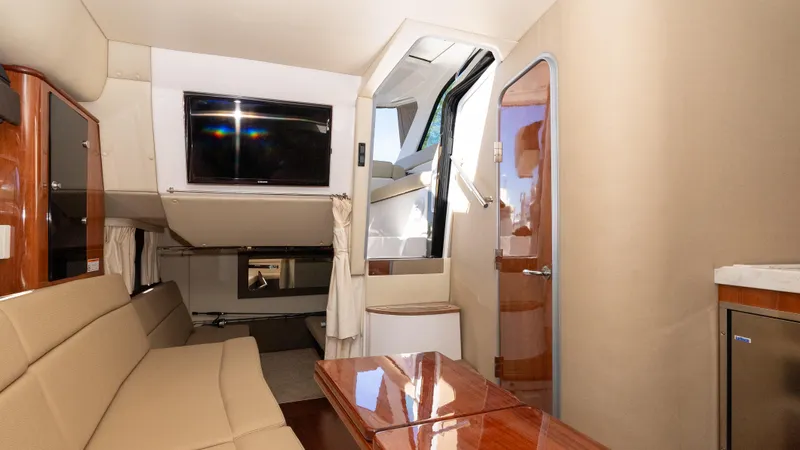  Yacht Photos Pics Interior of 2012 Regal 35 Sport Coupe with beige seating and modern amenities.