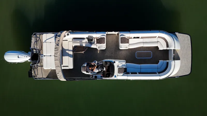 Yacht Photos Pics 2021 Bennington 27 QX pontoon boat, aerial view, on calm water.