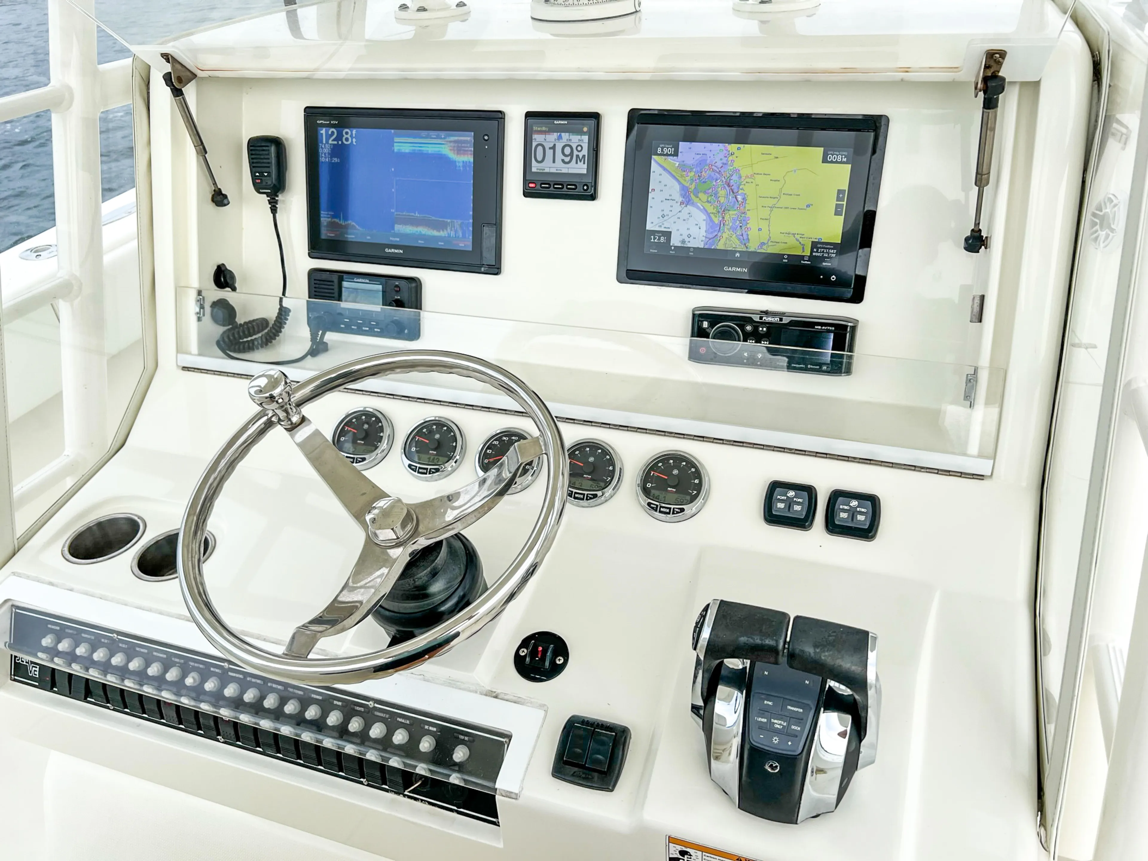  Yacht Photos Pics 2017 SeaVee 390z Center Console dashboard with navigation screens and controls.