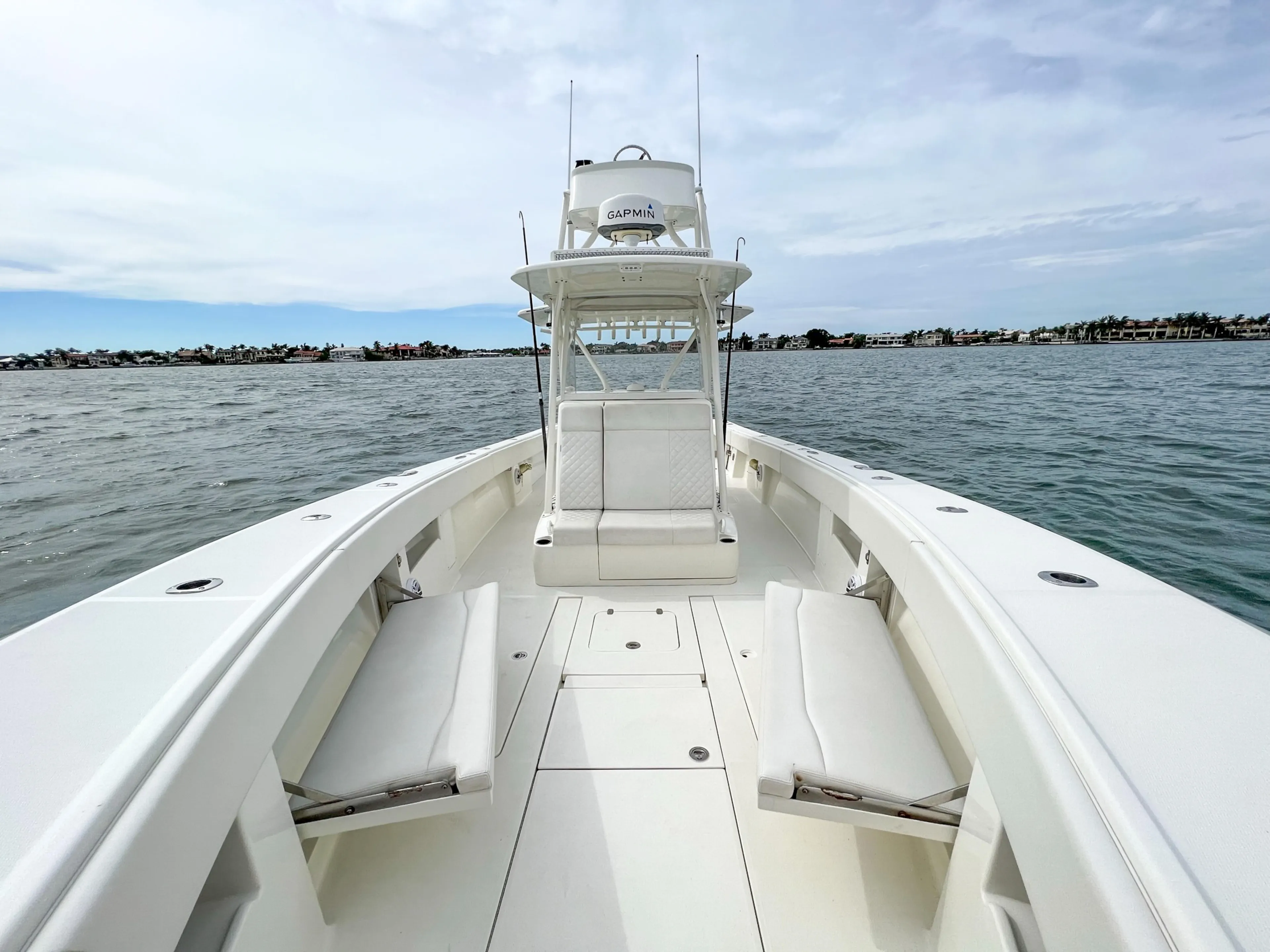  Yacht Photos Pics 2017 SeaVee 390z Center Console boat on open water, showcasing spacious deck and seating.