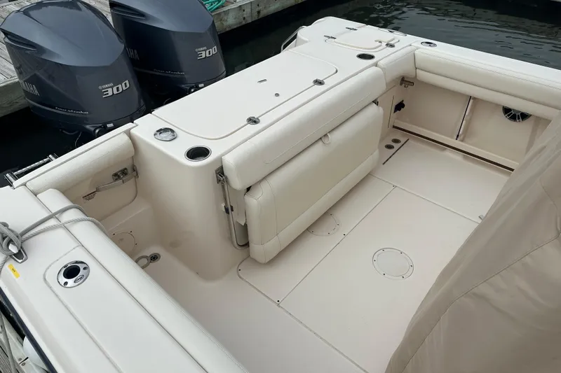  Yacht Photos Pics 2020 Grady-White Canyon 271 boat interior with Yamaha 300 engines, docked.