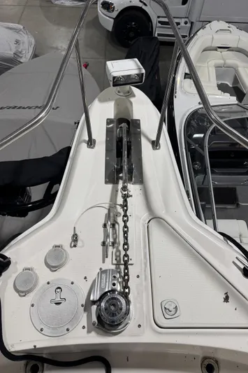 Kaboom Yacht Photos Pics 2000 Sea Ray 460 Sundancer boat deck with anchor chain and winch system.