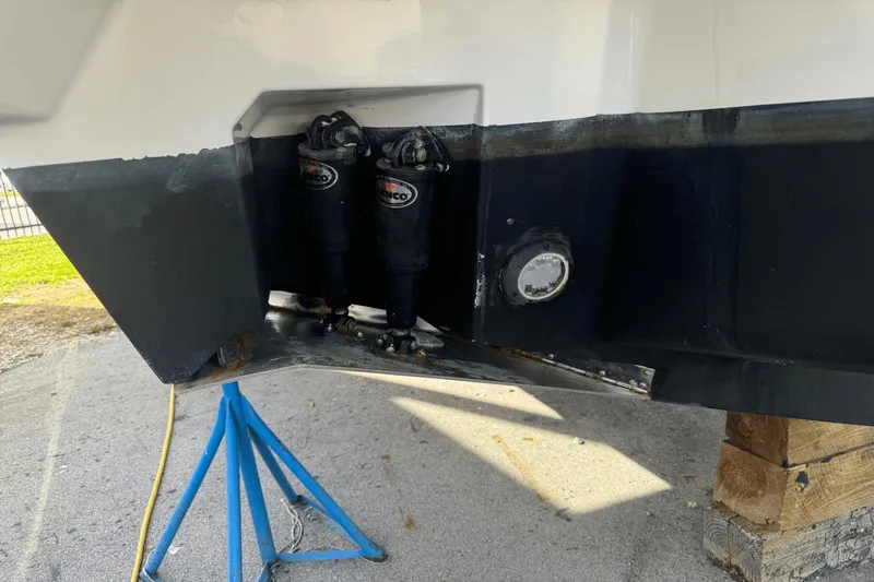  Yacht Photos Pics Close-up of 2019 Sea Ray 400 SLX OB boat hull on stands.