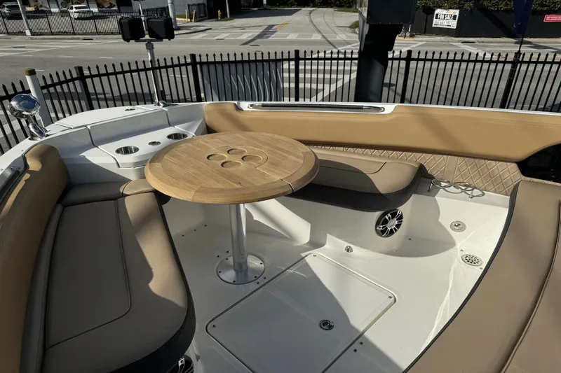  Yacht Photos Pics 2019 Sea Ray 400 SLX OB boat interior with tan seating and wooden table.