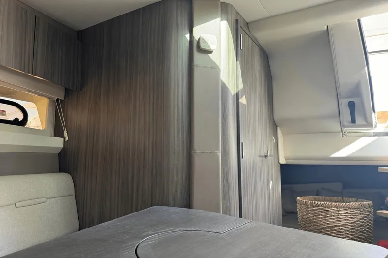  Yacht Photos Pics Interior of 2019 Sea Ray 400 SLX OB boat with modern wood paneling and seating.