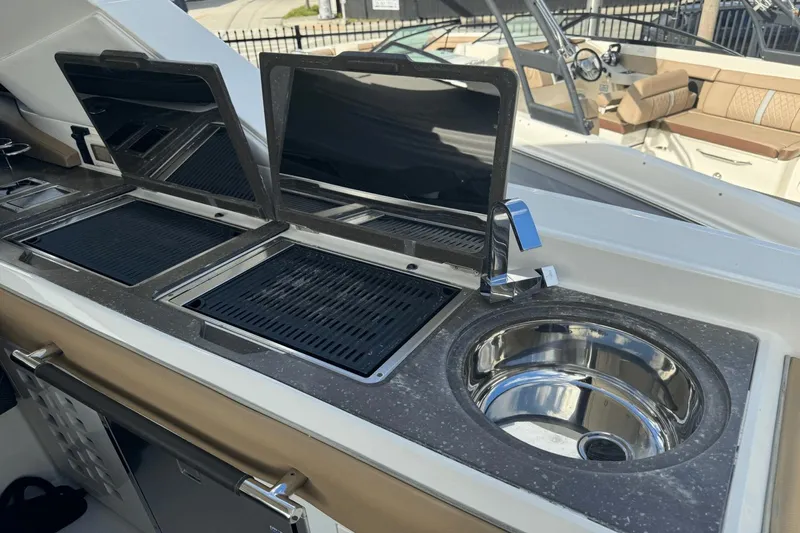  Yacht Photos Pics Outdoor kitchen on 2019 Sea Ray 400 SLX OB boat with grill and sink.