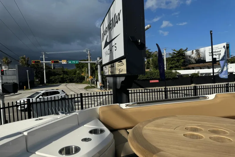  Yacht Photos Pics 2019 Sea Ray 400 SLX OB boat near MarineMax Yachts sign, urban street view.