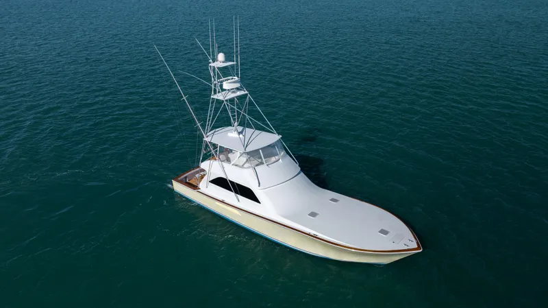 Sylva Lining Yacht Photos Pics 2001 Viking 61 Convertible yacht on calm blue water, aerial view.