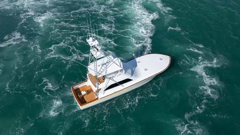 Sylva Lining Yacht Photos Pics Aerial view of 2001 Viking 61 Convertible yacht navigating through ocean waters.