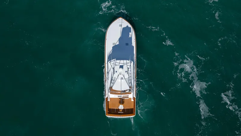 Sylva Lining Yacht Photos Pics Aerial view of 2001 Viking 61 Convertible yacht on open water.