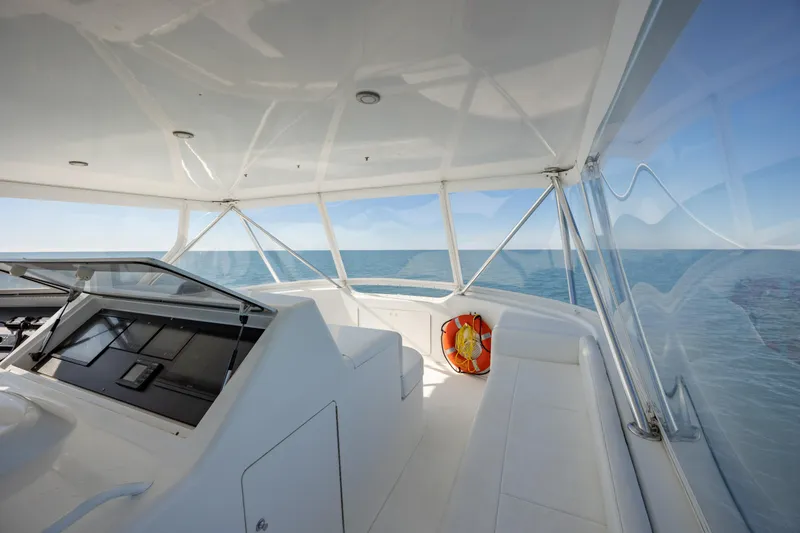 Sylva Lining Yacht Photos Pics 2001 Viking 61 Convertible yacht interior with ocean view and life preserver.