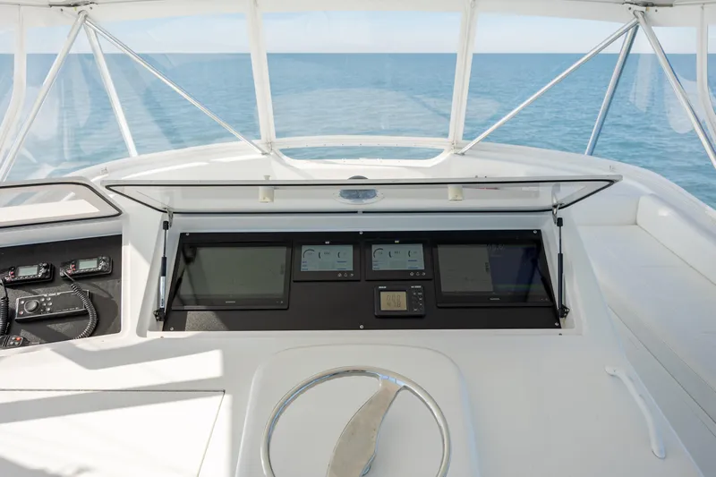 Sylva Lining Yacht Photos Pics Control panel of a 2001 Viking 61 Convertible yacht with ocean view.