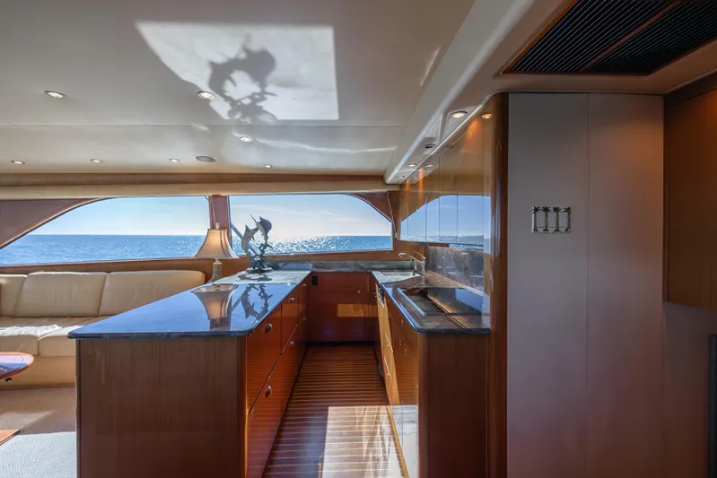 Sylva Lining Yacht Photos Pics Luxurious interior of 2001 Viking 61 Convertible yacht with ocean view.