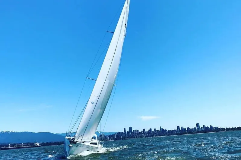 Xiomara Yacht Photos Pics 2019 X-Yachts X4&sup3; sailing near city skyline under clear blue sky.