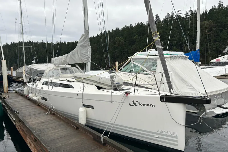 Xiomara Yacht Photos Pics 2019 X-Yachts X4&sup3; sailboat docked at marina with forest backdrop.