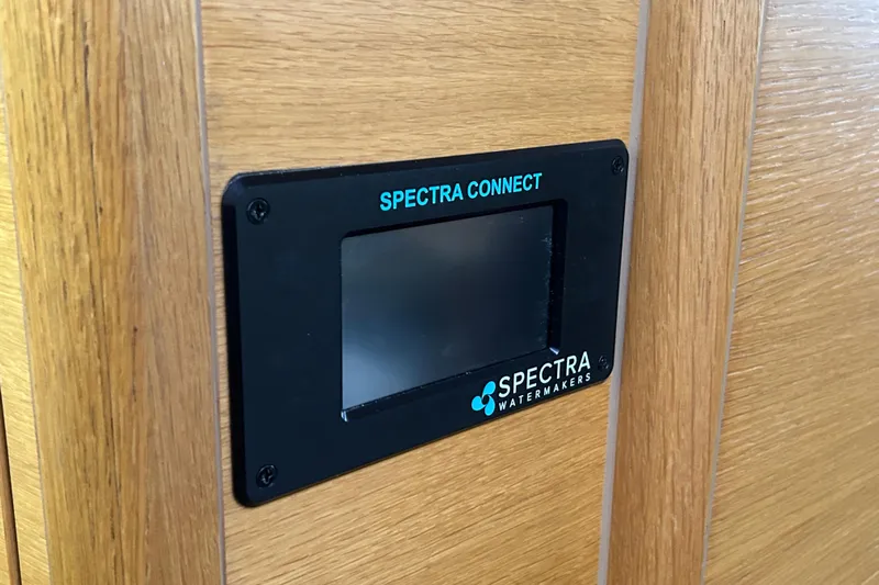 Xiomara Yacht Photos Pics Spectra Connect watermaker control panel on 2019 X-Yachts X4&sup3; interior wood panel.