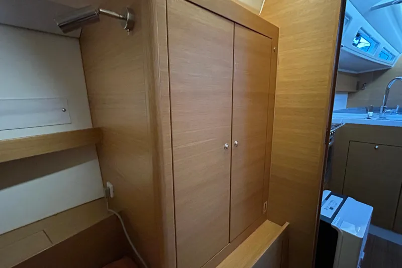 Xiomara Yacht Photos Pics 2019 X-Yachts X4&sup3; interior with wooden cabinetry and modern kitchen area.